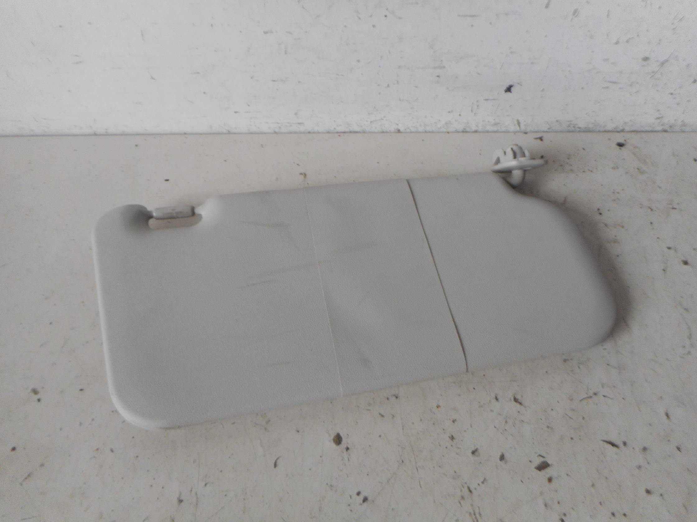 Aletta parasole parabrezza sx.